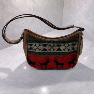 Maggie B wool felted purse with adjustable straps and leather trim inside zipper